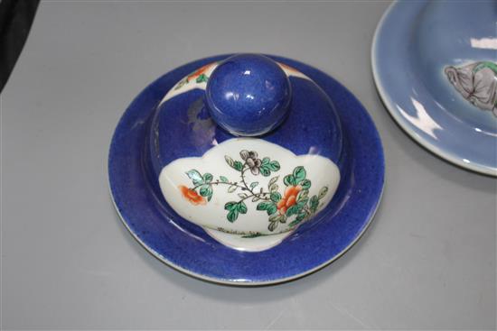 Three Chinese blue ground covers, late 19th century, including a pair with famille verte reserves, diameter approx. 17cm, internal rim